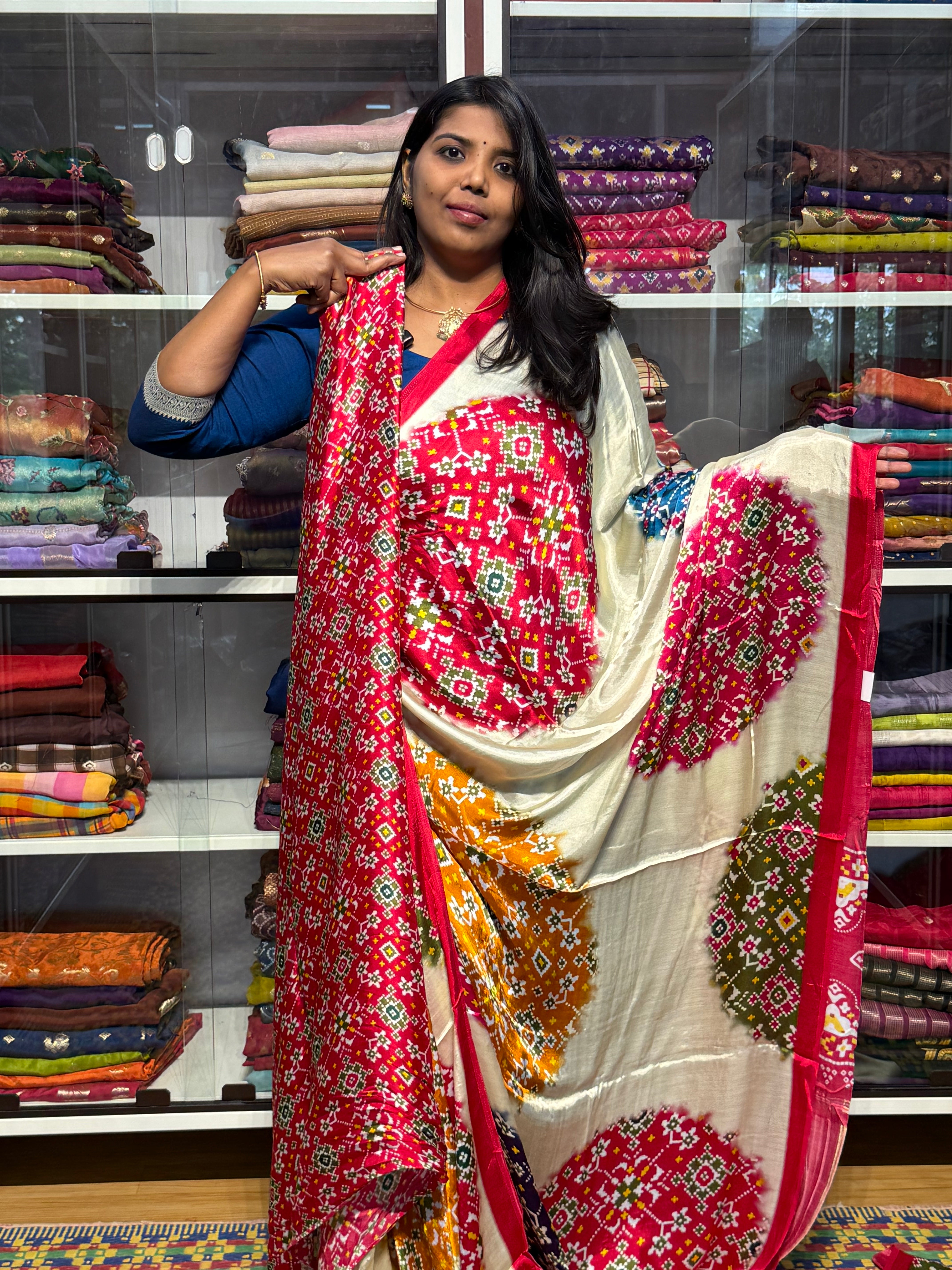 Modal gajji silk saree with tissue pallu and multicolor patola print