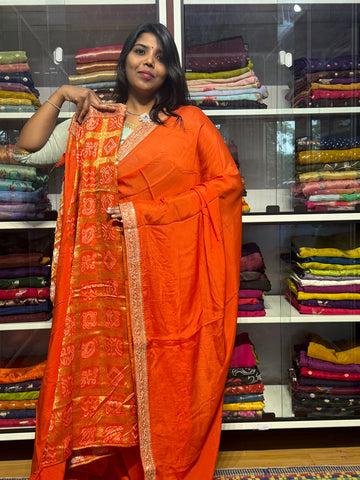 PURE CHIFFON SILK WITH SABYASACHI INSPIRED LACE AND BANDINI GARCHOLA BLOUSE: ORANGE