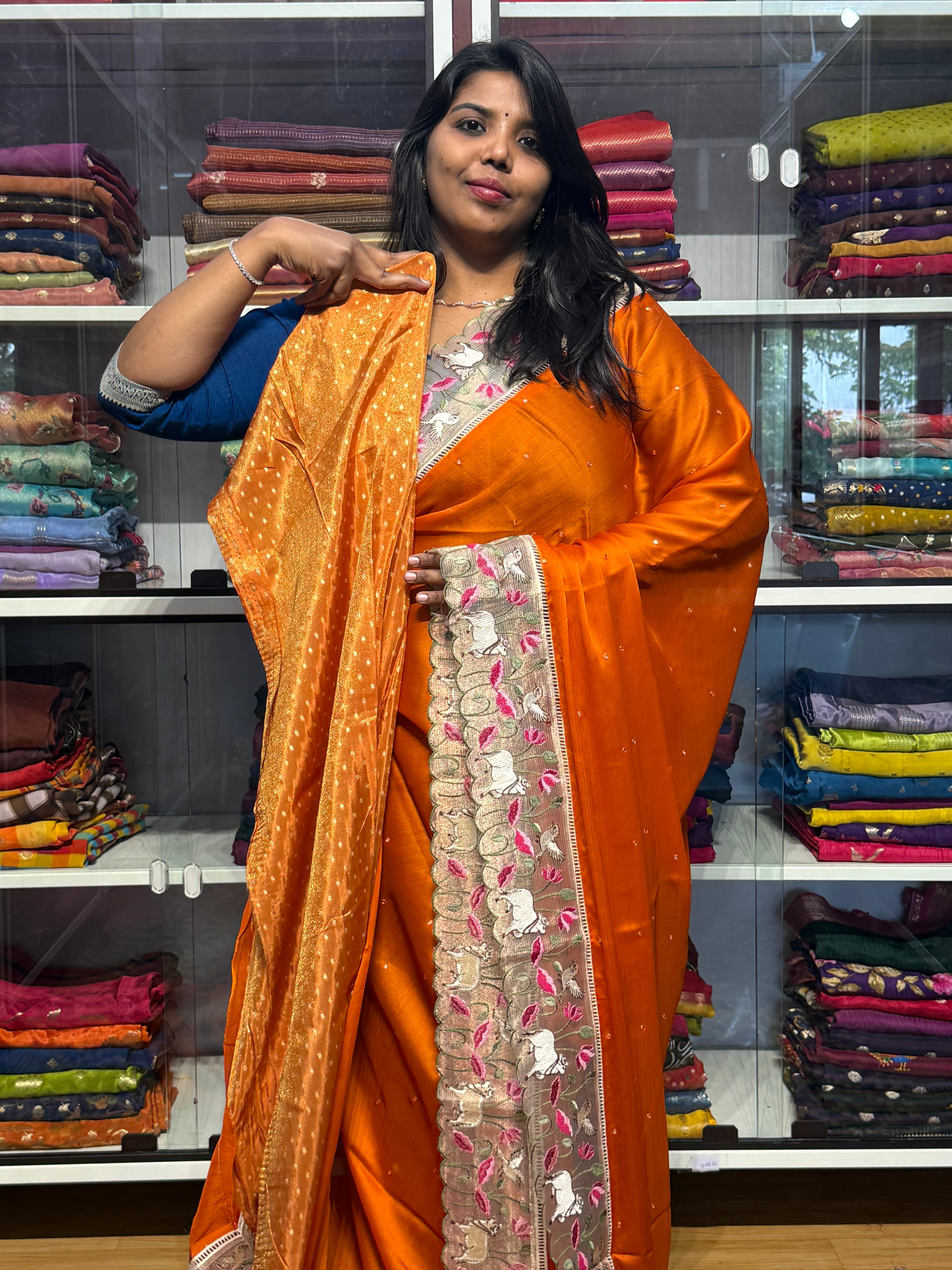 PURE CHIFFON SARESS WITH BIRDS EMBROIDERY SCALLOP BORDER AND MIRROR WORK: ORANGE