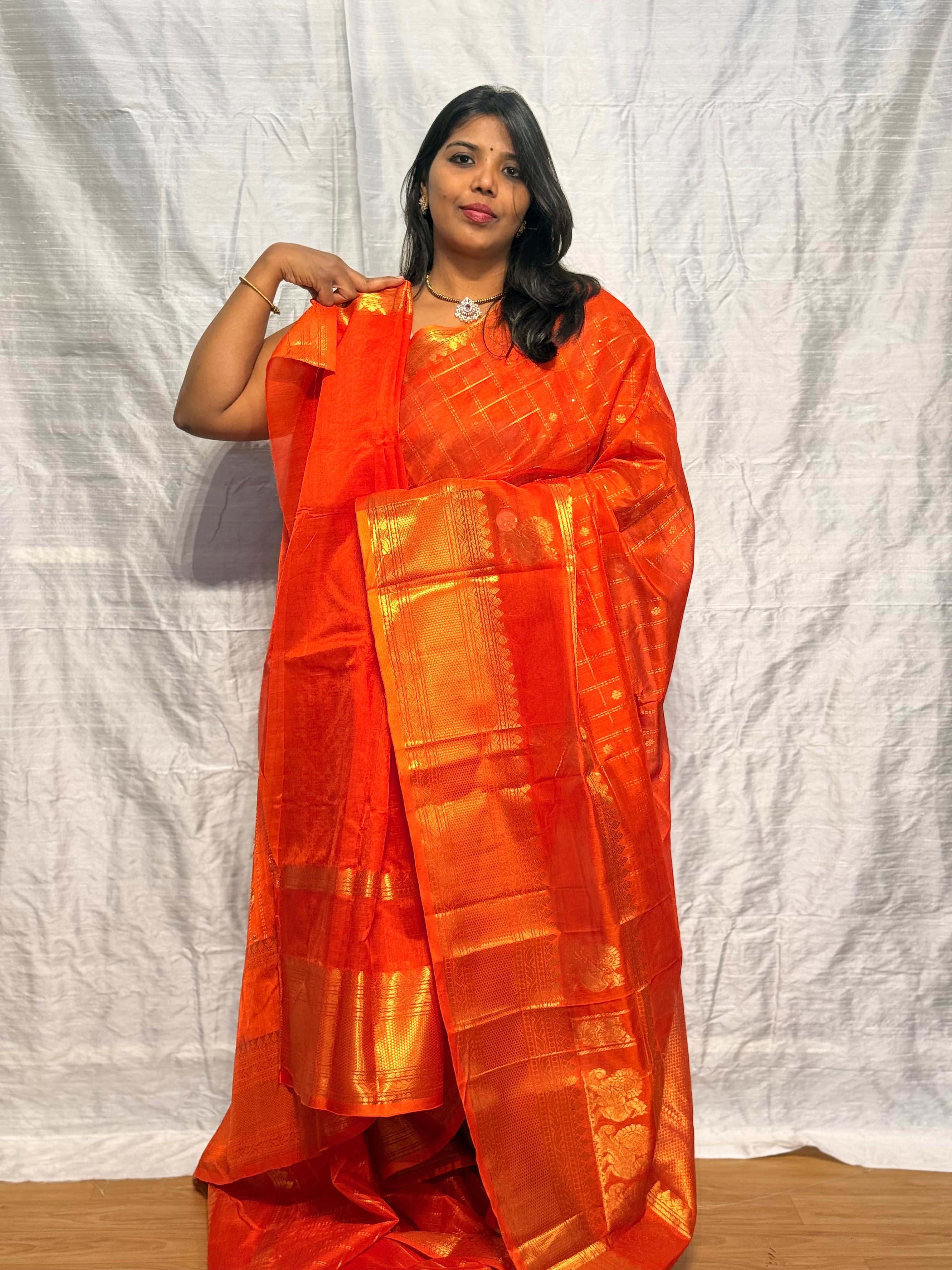 Mangalgiri pattu saree with nemali butis in gap border and checks allover: ORANGE