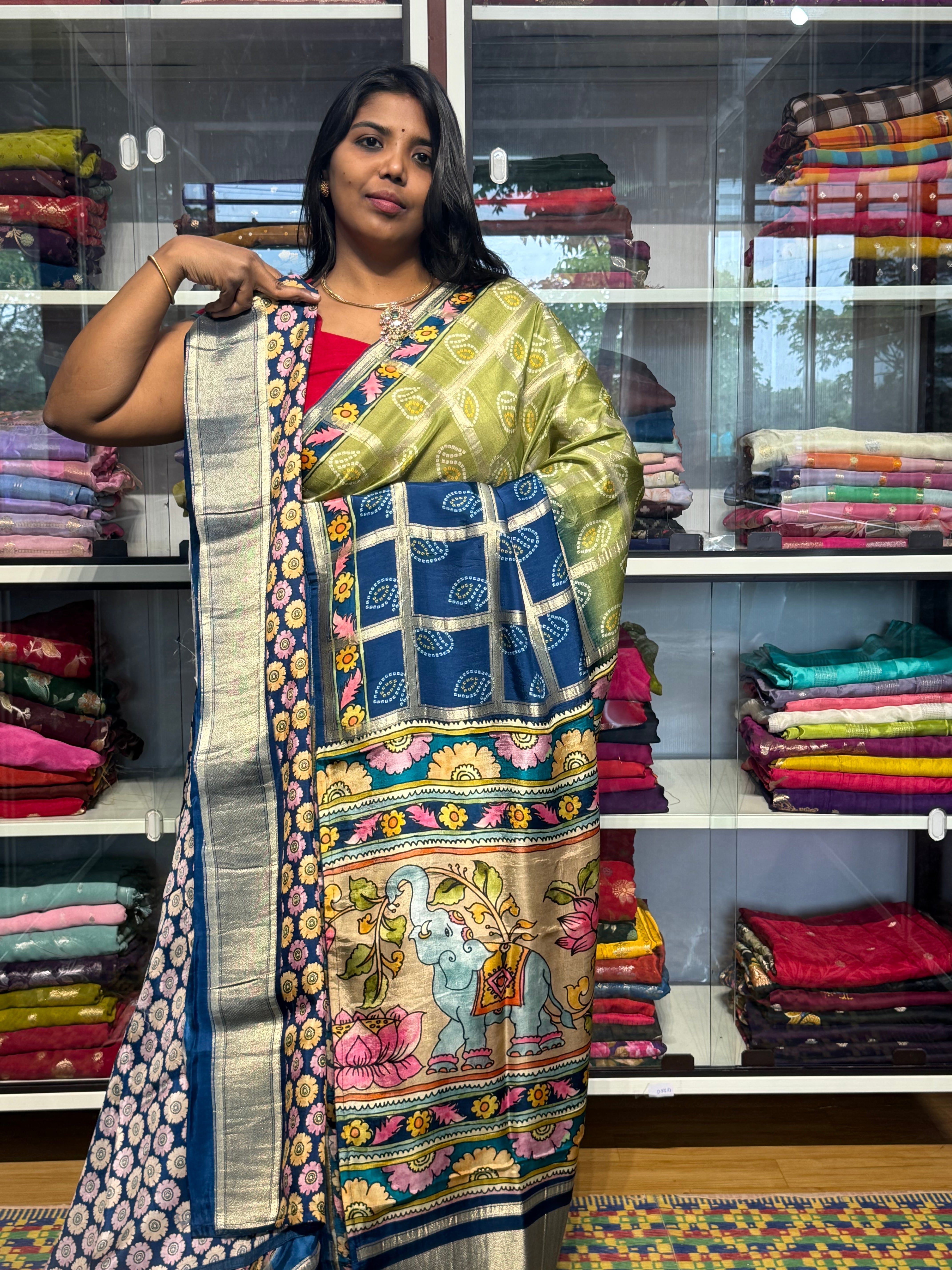 PENKALAMKARI DIGITAL PRINT ON CHECKS MUNGA CREPE SAREE: PARROT GREEN WITH BLUE