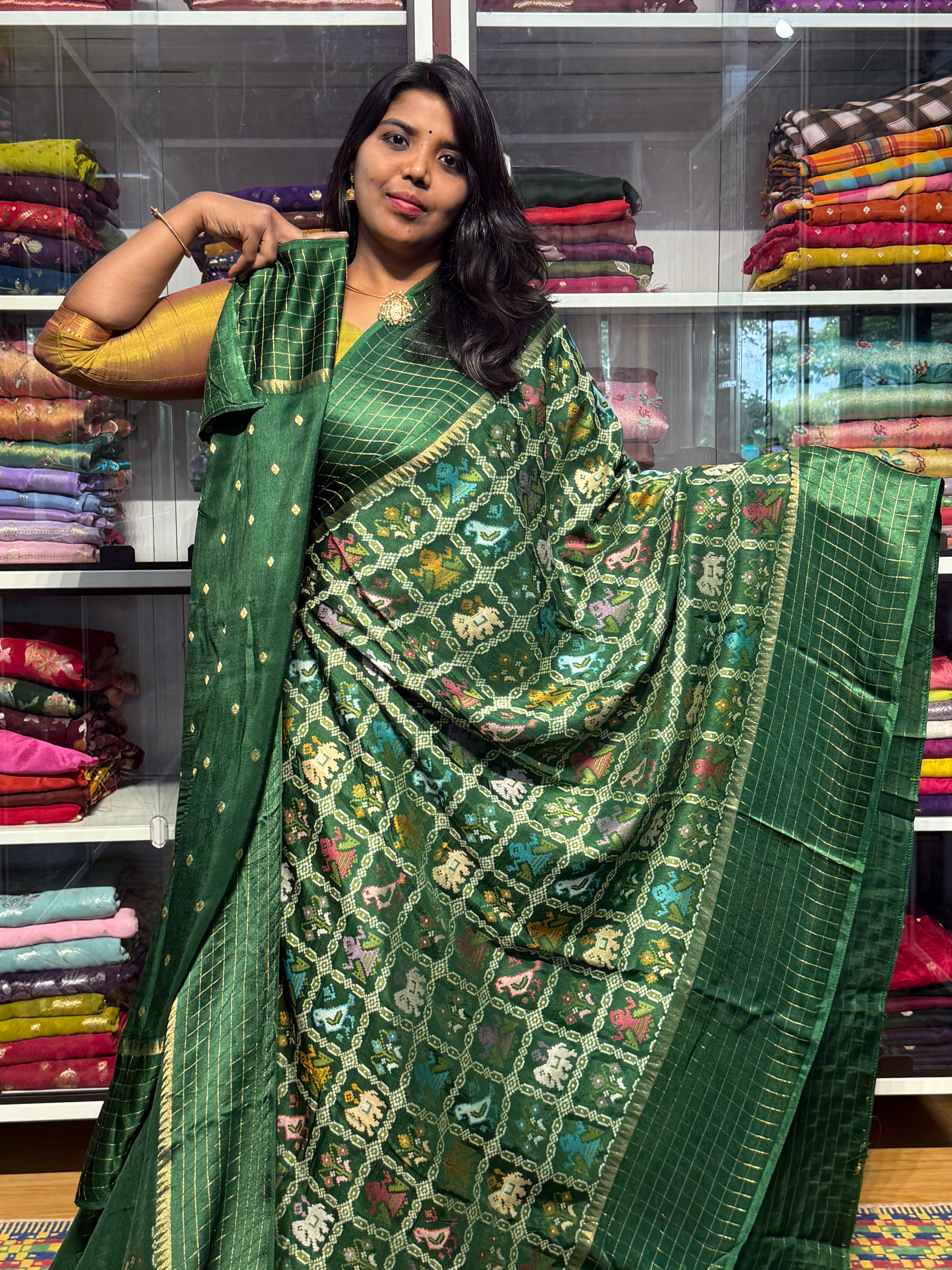 IKKAT NARIKUNJ WEAVING ON MUNGA CREPE: GREEN